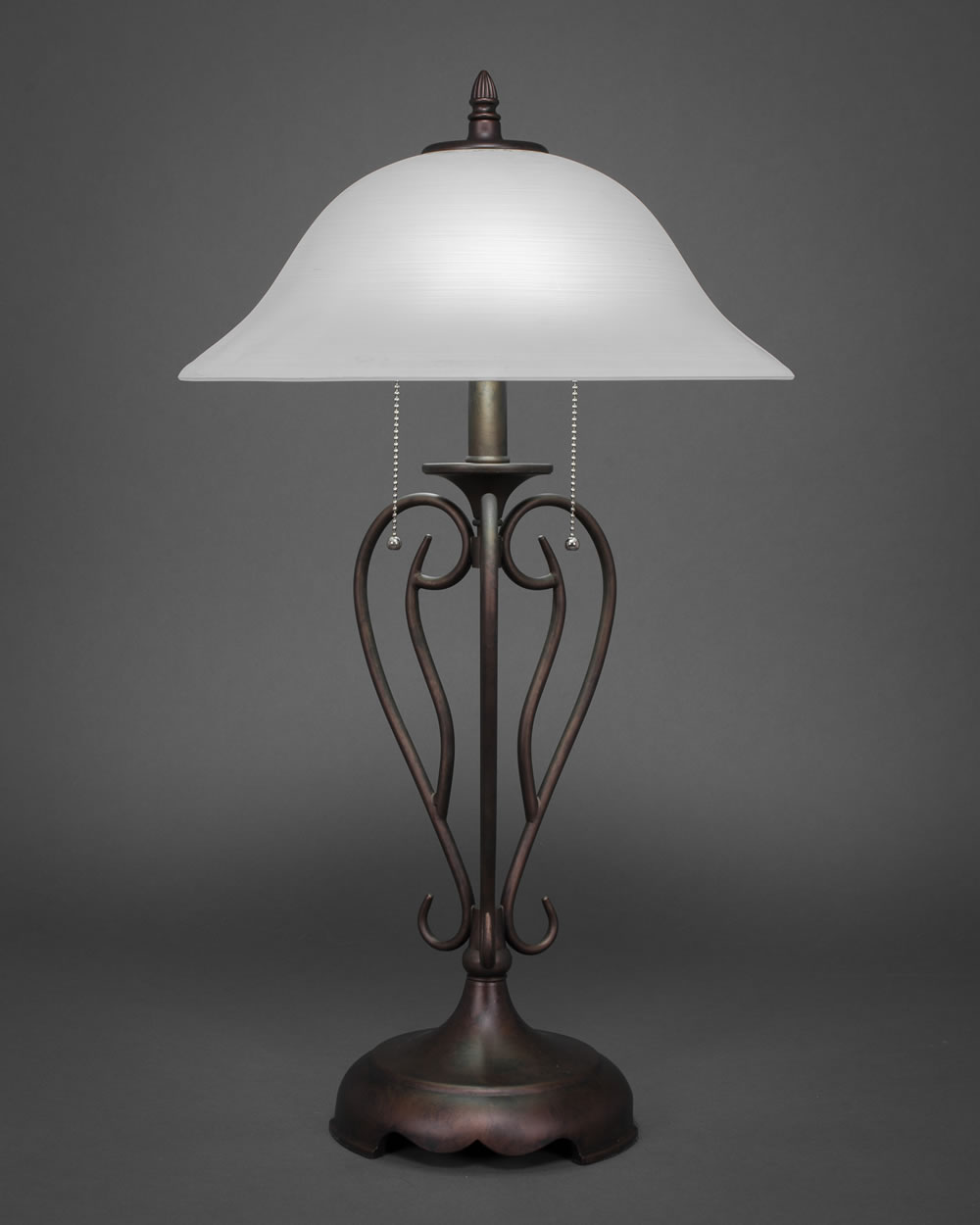 Olde Iron Table Lamp Shown In Bronze Finish With 16" White Linen Glass