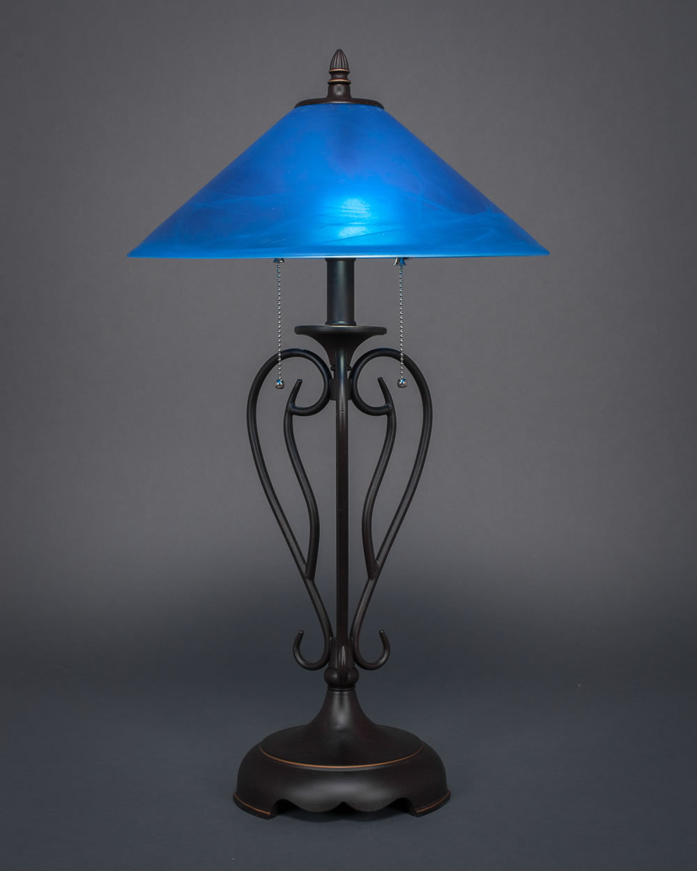 Olde Iron Table Lamp Shown In Dark Granite Finish With 16" Blue Italian Glass