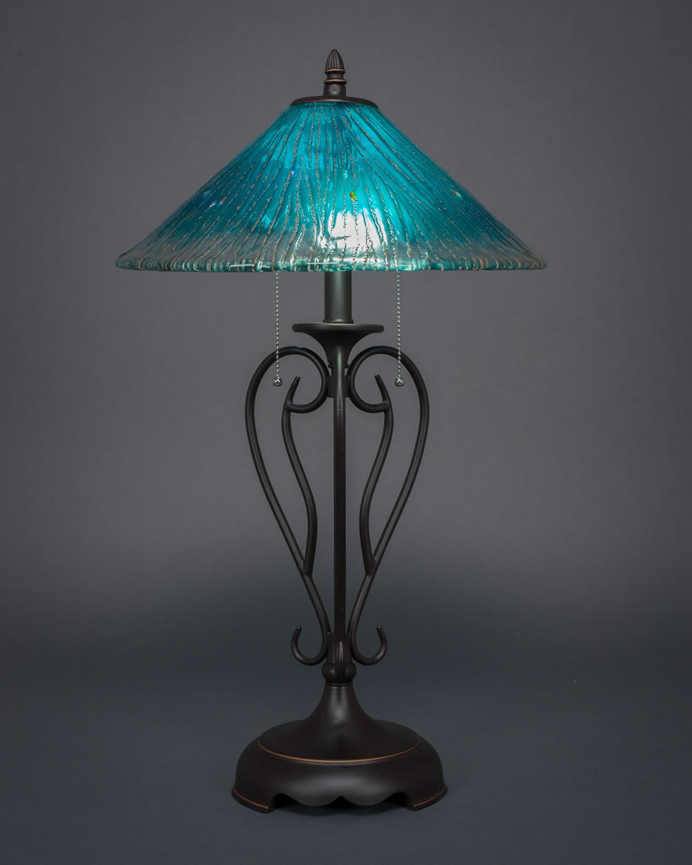 Olde Iron Table Lamp Shown In Dark Granite Finish With 16" Teal Crystal Glass