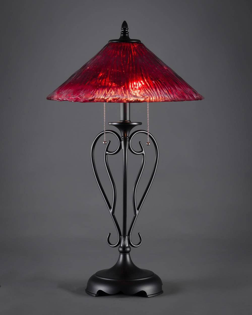 Olde Iron Table Lamp Shown In Matte Black With 16" Raspberry Crystal Glass