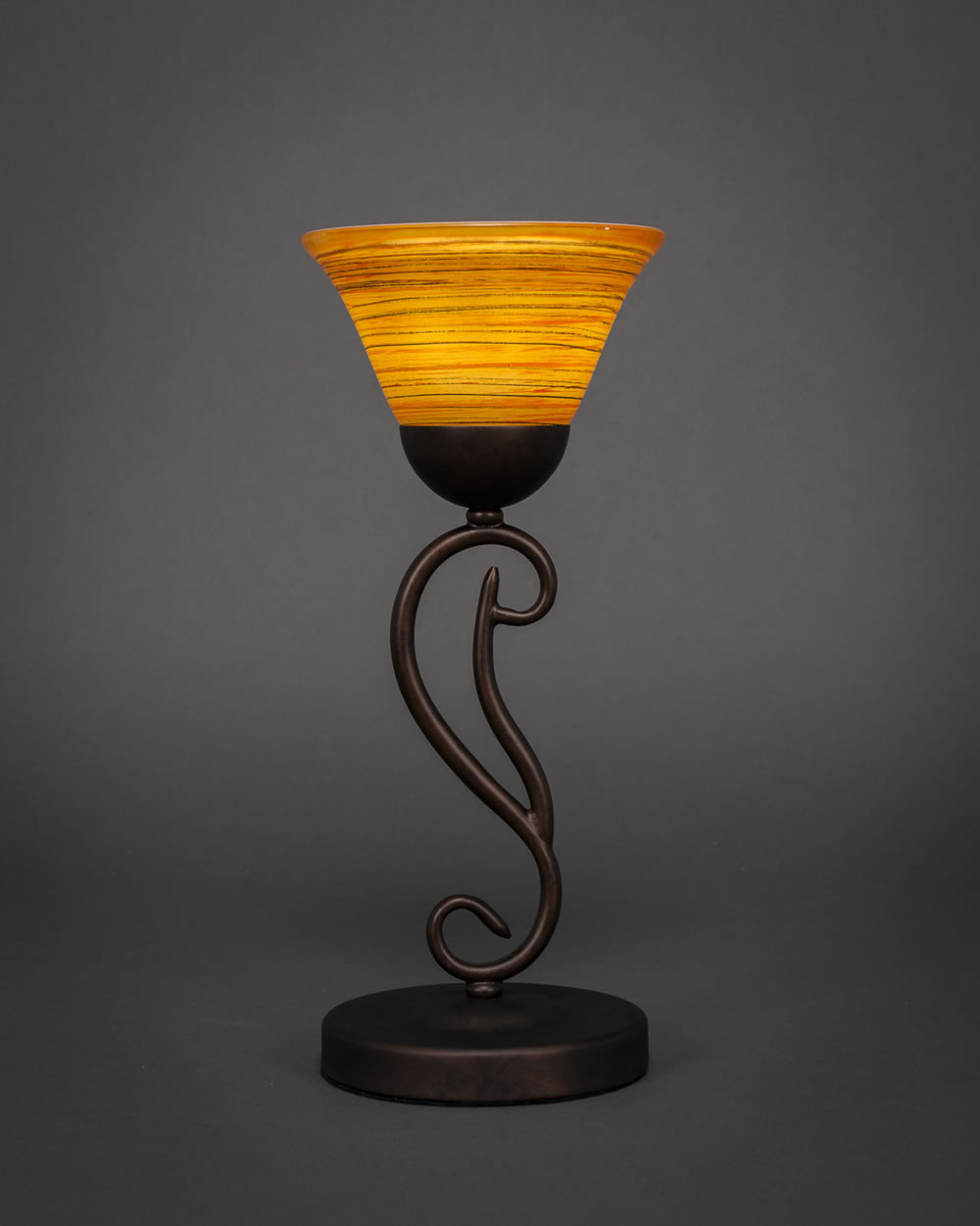 Olde Iron Mini Table Lamp Shown in Bronze Finish With 7 Firré Saturn Glass